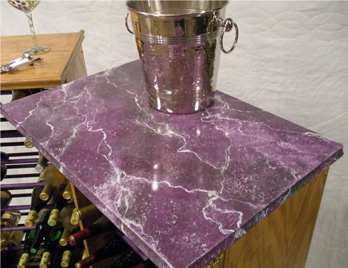 The top of the Red Wines rack that
              Sue faux finished to look like purple marble.