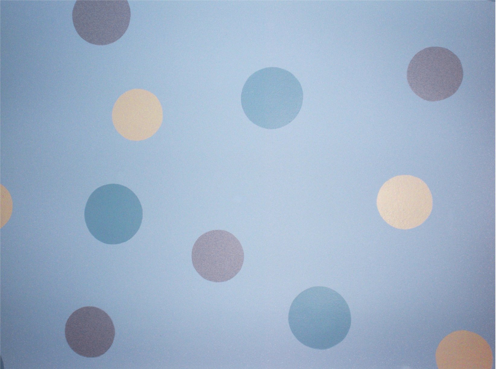 I'm a creative polka dot faux finish on a solid background.