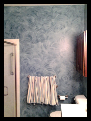 This is a bold wash faux finish with light gray
                over dark blue background.